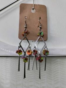 Eiffel Tower Graphic Top with Shiny Earrings.
