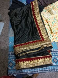 Elegant Black Saree with Gold Border