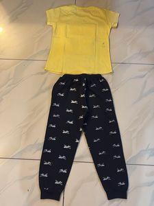 yellow Cartoon T-shirt and black sports lower