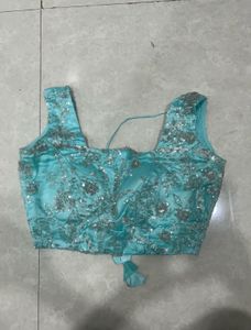 Blue embellished blouse