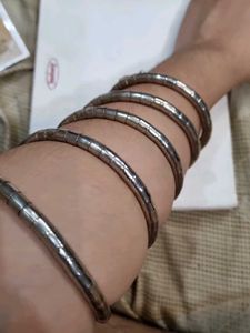 Set of Unique Silver Bangles