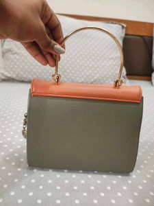 Chic Two-Tone Handbag with Gold Handle