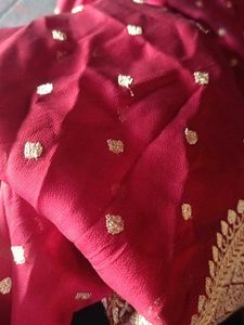 Maroon Georgette Saree with Golden Motifs