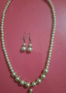 neck piece with earing