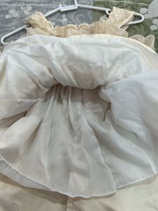Elegant Cream Ruffled frock