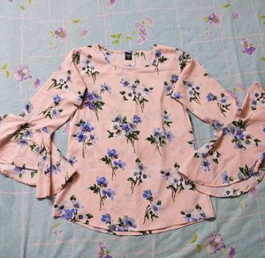 Buy This Pink Bell-Sleeve Top Before Someone Else