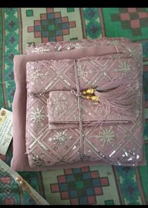 Elegant Pink Saree with Embellished Blouse