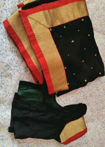 Elegant Black Saree with Gold & Red Border