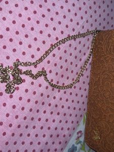 Elegant Embossed Clutch and sling bag