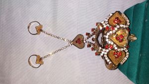 Adjustable Bracelet With Attached Two Ring Red Whi