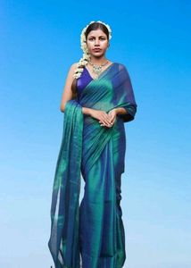 Royal Tissue Saree – Soft, Flowing & Festive Ready