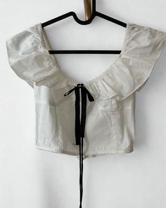 White Ruffle Crop Top with Black Bow