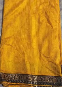 Elegant Yellow Saree with Embellished Border