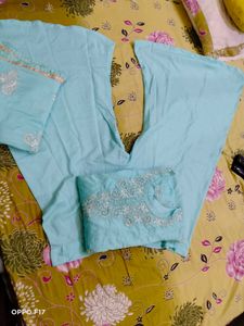 stitched suit with zipper storage  packet.