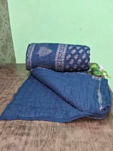 Blue Patterned Quilt Wait 1.850