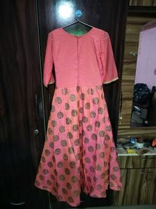 Elegant Coral Gown with Gold Accents