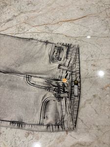 grey jeans