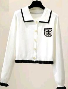 Chic White Cropped Cardigan with Black Trim