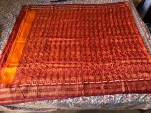 Vibrant Orange and Red Ikat Saree