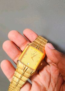 Titan Elegant Gold Tone Tank Watch