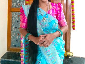pink blouse blue saree