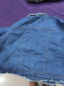 Denim Jacket with Frayed Edges