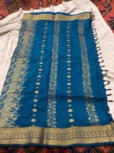 Elegant Teal Blue Saree with Gold Border