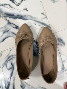 Nude synthetic leather flat bellies