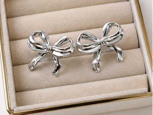 Chic Silver Bow Earrings