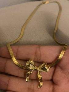 anti tarnished Gold Tone Bow Necklace
