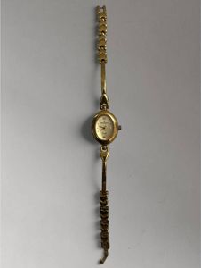 Elegant Timesquartz Gold-Tone Watch