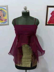 Exquisite Maroon Peplum top with golden mini skirt