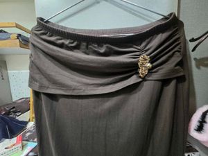 Elegant Brown Maxi Skirt with Brooch Detail