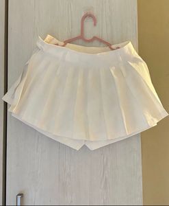 White pleated skort