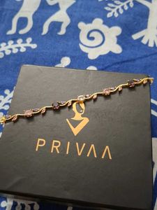 Elegant Gold-Tone Bracelet with Gems