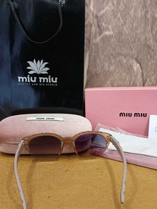 Miu-Miu women's Sungl