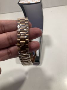 Rose Gold Rolex Watch with Green Dial
