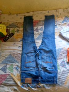 Distressed Blue Denim Jeans