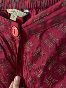 Global Desi Flared Maroon Printed Palazzo Pants