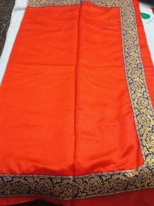 Vibrant Orange Saree with Blue Border