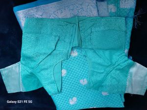 Elegant Teal Saree with Silver Weave