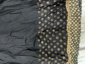Elegant Black Lehenga with Gold Border