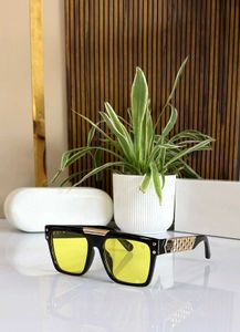 Philip Plein Stylish Black Sunglasses with Yellow