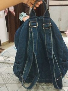 Blue Denim Backpack with Multiple Zip Compartments