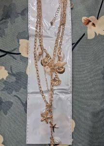 Boho Seashell Layered Necklace and rings from sava