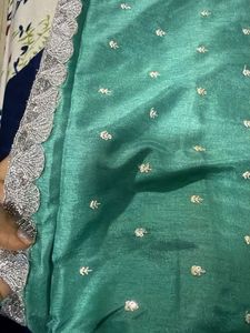 Elegant Teal Saree with Silver Border