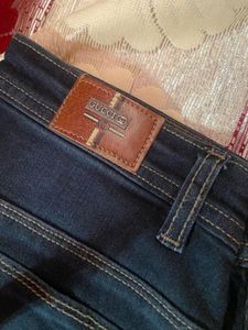 Distressed Dark Wash Flare Jeans