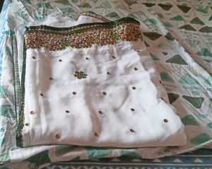 Elegant White Saree with Embellishments