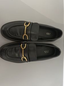 Stylish Black Loafers with Gold Hardware