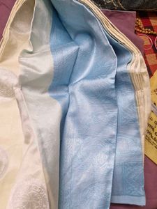 Elegant Cream Saree with Silver Motifs.new one